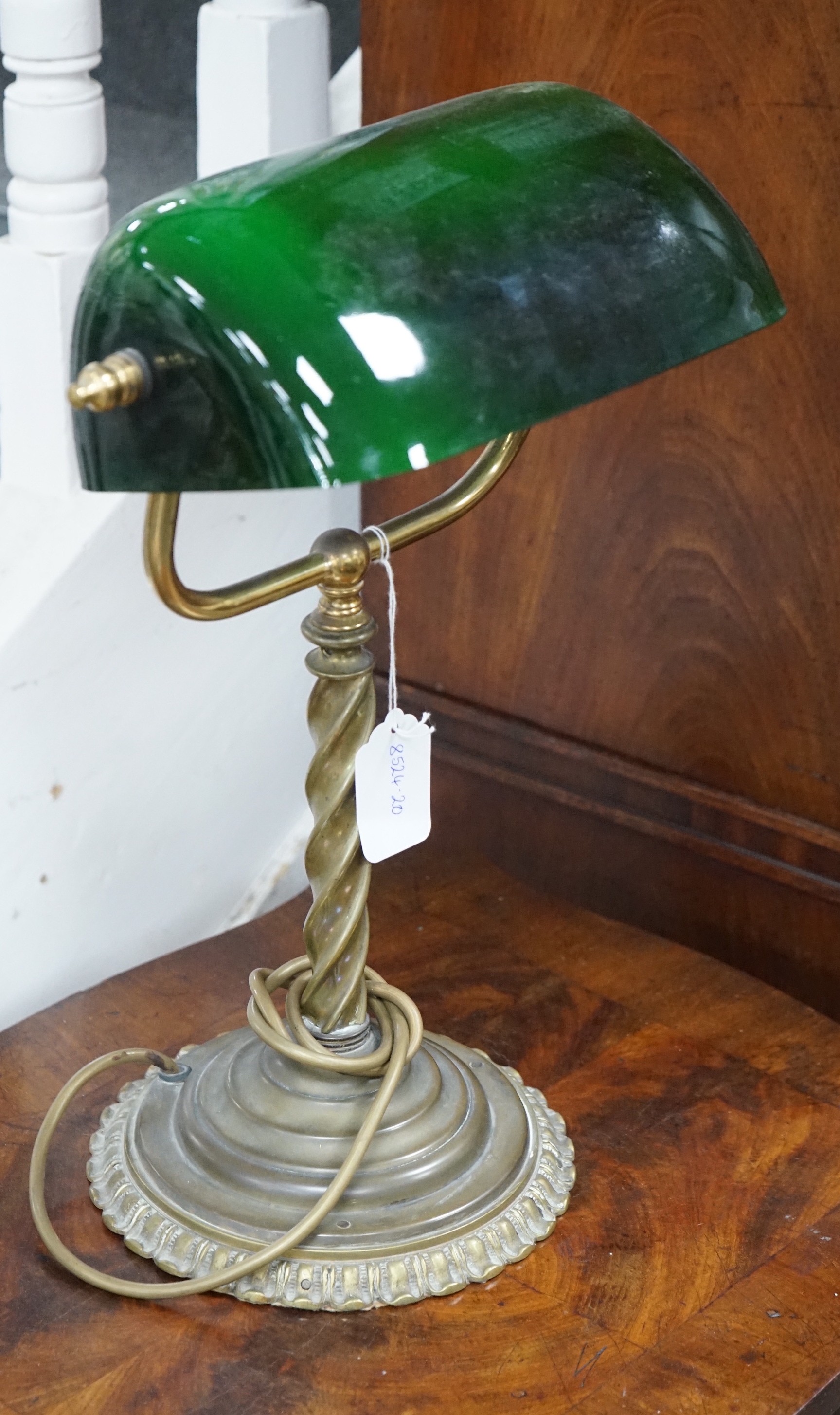 A brass twist stem student’s lamp, 41cm tall